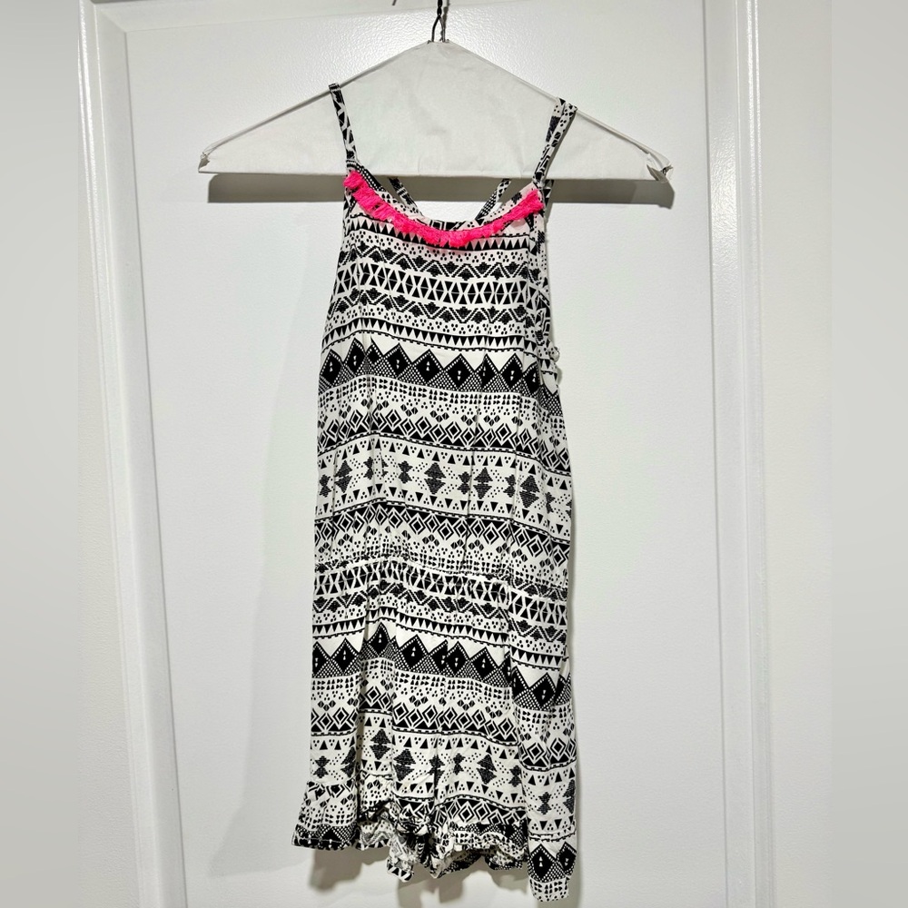 Girls lightweight flowy romper. Crisscross spaghetti strap back (adjustable) 7/8